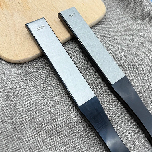 Double sided diamond whetstone with handle